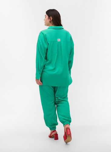 Loose viscose trousers with elastic borders and pockets, Mint, Model image number 1