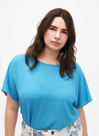 Short sleeved blouse with round neckline, Hawaiian Ocean, Model