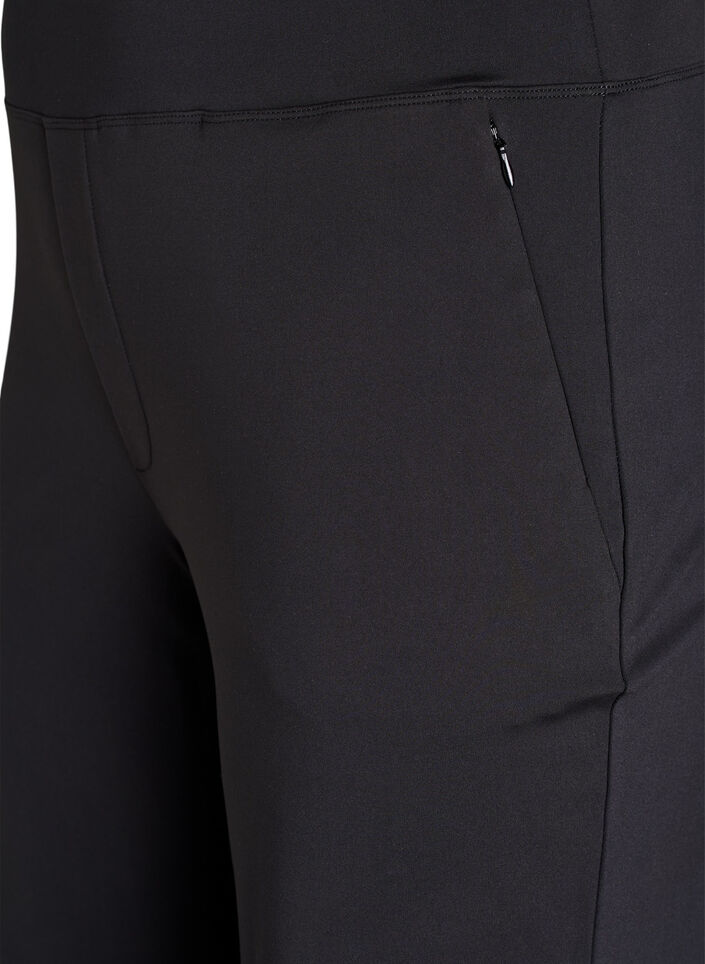 Stylish workout trousers with a slight flare, Black, Packshot
