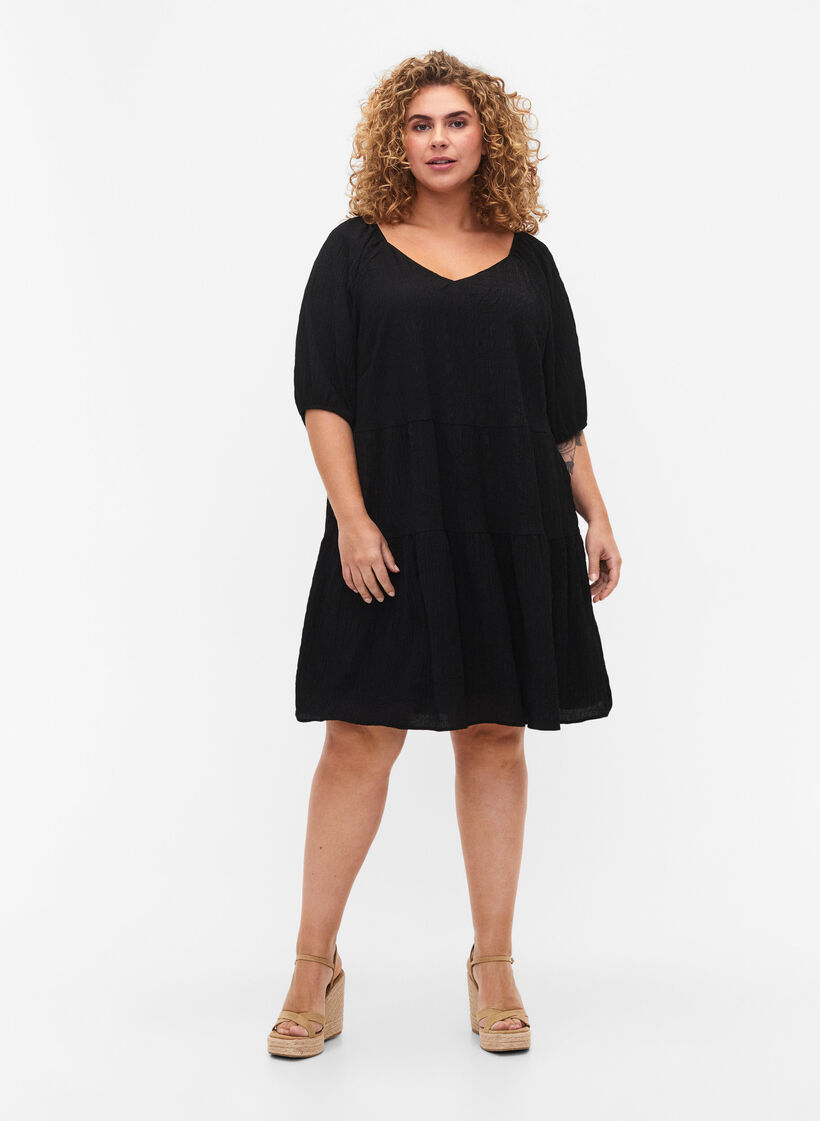 A-shaped short dress with a V-neck, Black, Model image number 2
