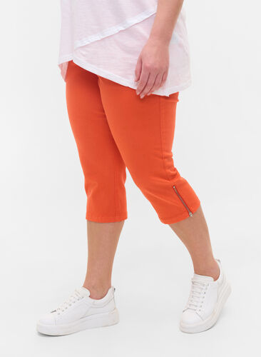 Close-fitting capris with zip, Orange , Model image number 1