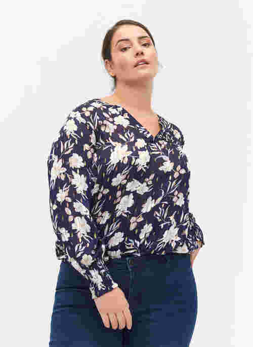 Printed top with smock and v-neckline