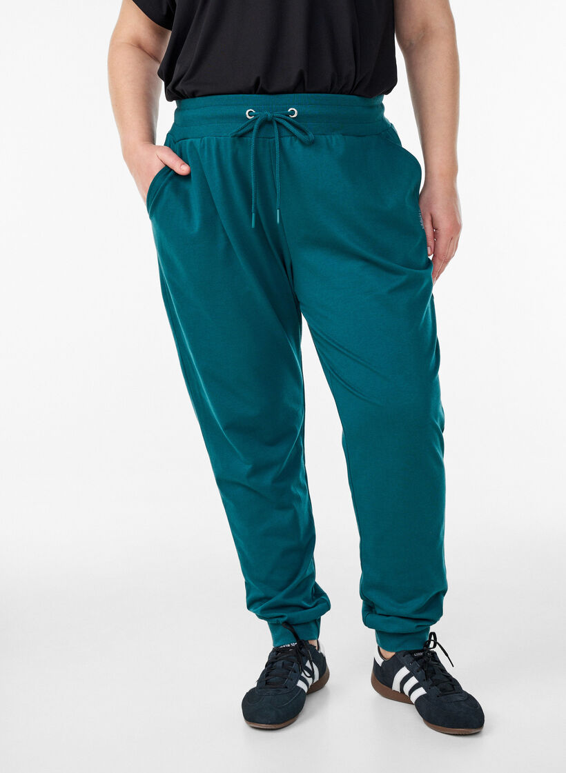 Loose tracksuit trousers with pockets, Green, Model image number 0