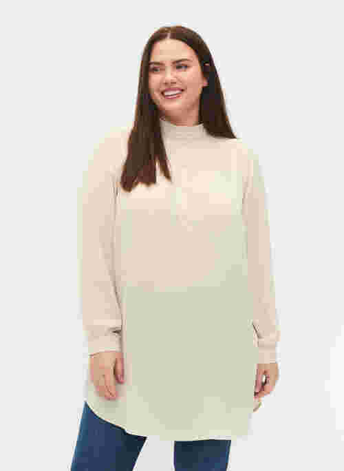 Long-sleeved tunica with ruffle collar