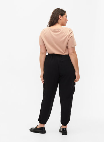 Loose cargo trousers in viscose, Black, Model image number 1