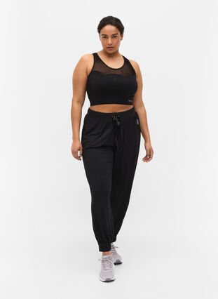 Loose viscose exercise trousers, Black, Model image number 2