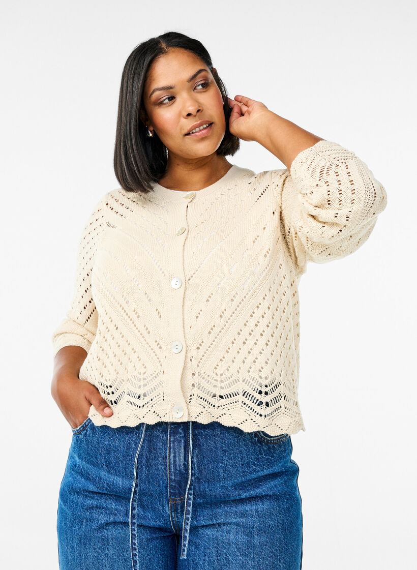 Short knitted cardigan with eyelet pattern, Sandshell, Model image number 0