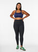 Sports bra with front closure and high support, Blue, Model image number 1