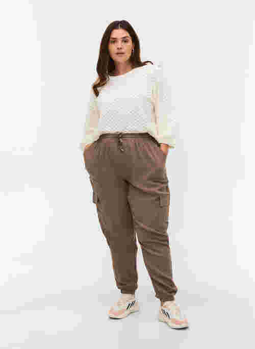 Loose viscose trousers with large pockets