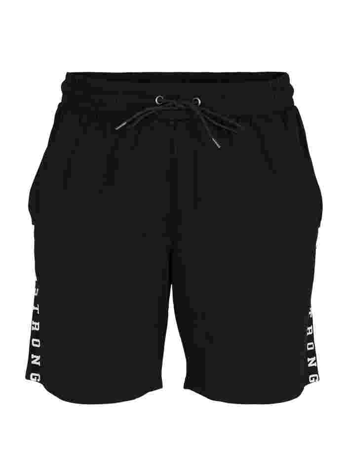 Loose shorts with text print, Black, Packshot image number 0
