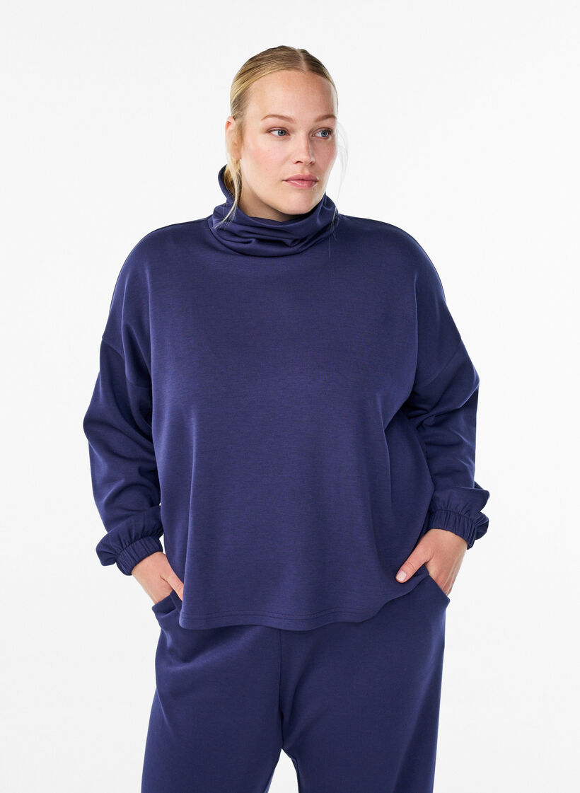 Blouse with turtleneck in modal mix, Blue, Model image number 0