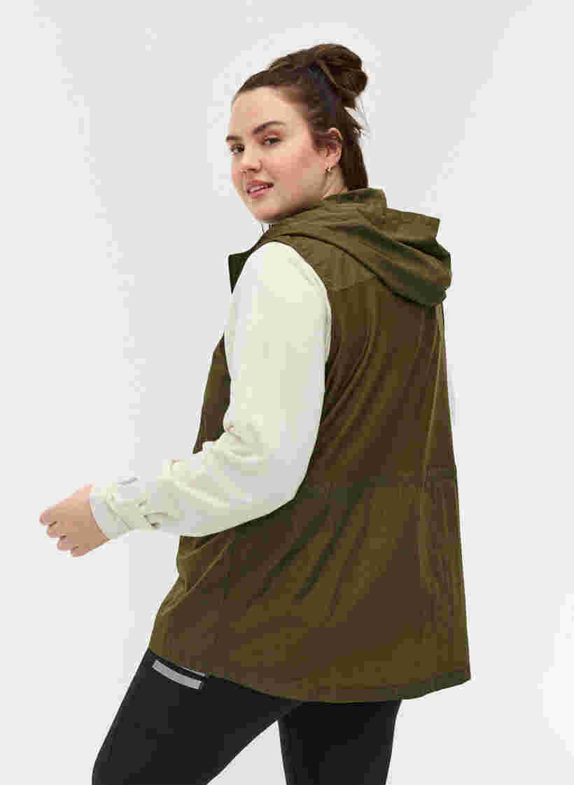 Hooded sports vest with adjustable waist, Forest Night, Model image number 1
