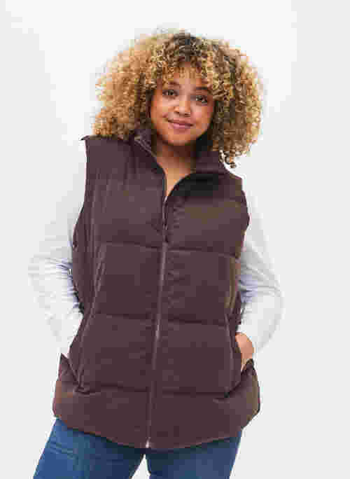 Short vest with high collar and pockets