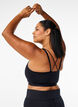 Sports bra with cross detail at the back, Black, Model image number 2