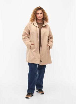 Jacket with pockets and high collar, Nomad, Model image number 2
