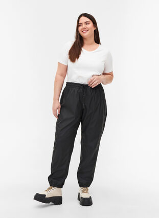Rain trousers with taped seams, Black, Model image number 0