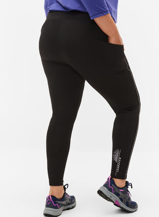 Sports tights with reflective details and side pocket, Black, Model image number 3