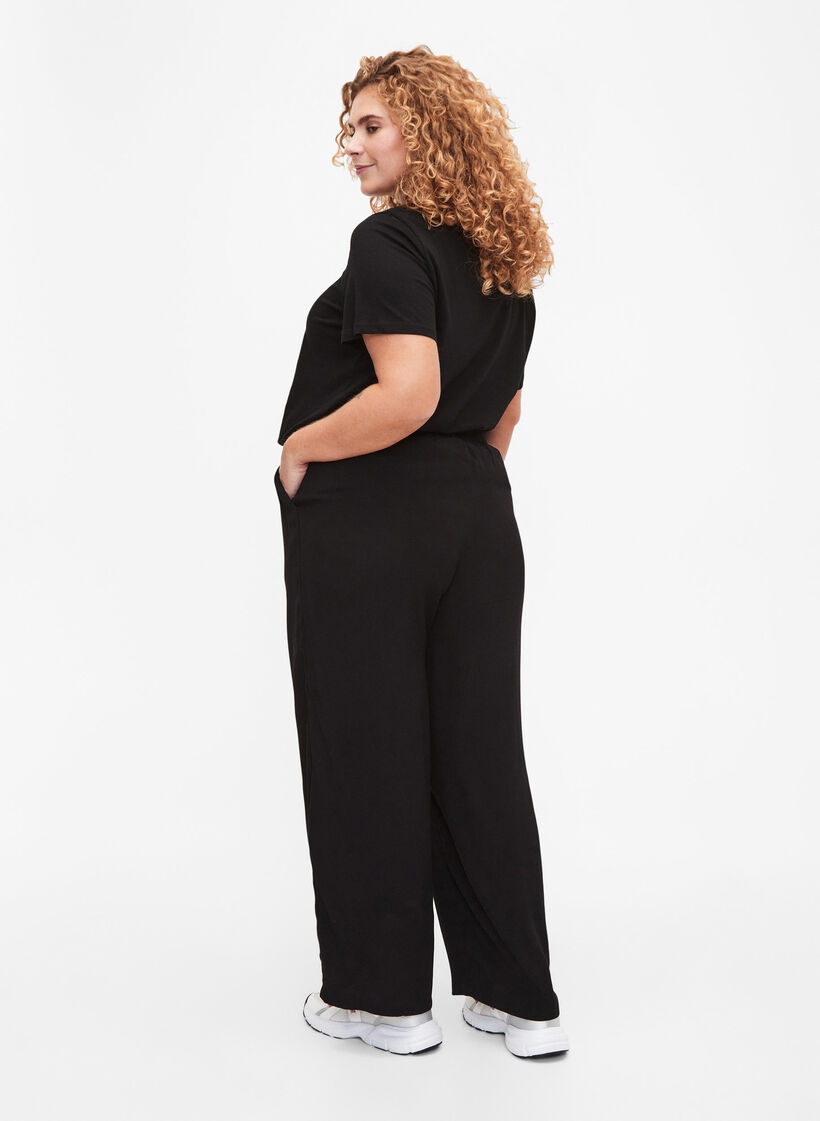Loose viscose trousers with print, Black, Model image number 1