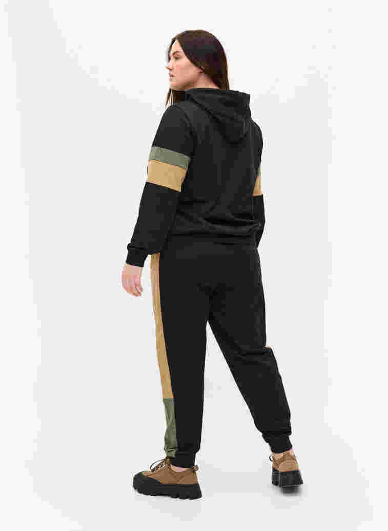 Sweatpants with track details, Black/Camel, Model image number 1