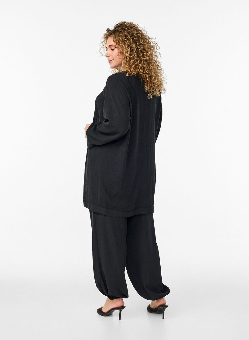 High-waisted balloon trousers, Black, Model image number 1