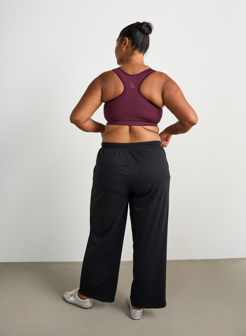 Wide-leg training trousers with a high waist, Black, Model image number 1