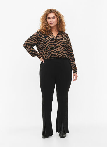 Flared trousers with slits in front, Black, Model image number 0