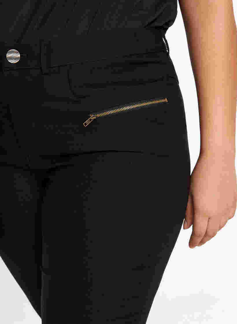 Close-fitting trousers with zipper details, Black, Model image number 2