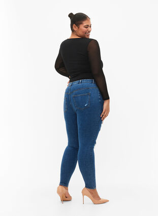 Tight-fitting jeans with rip details, Blue denim, Model image number 1