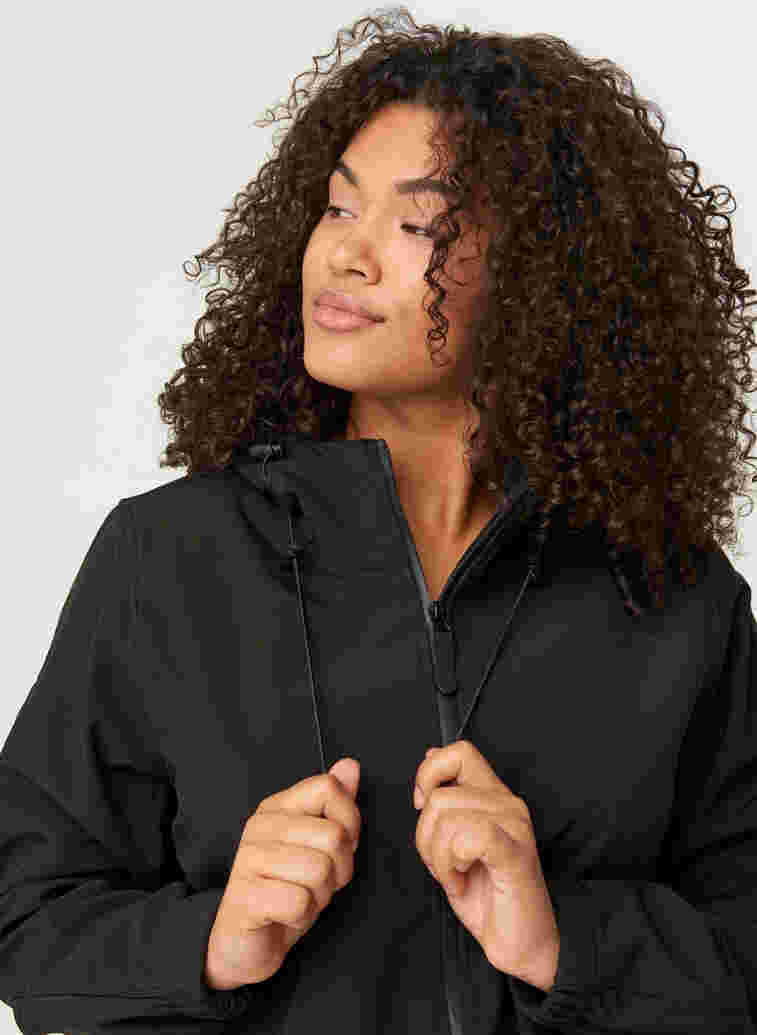 Short, hooded softshell jacket, Black, Model image number 4