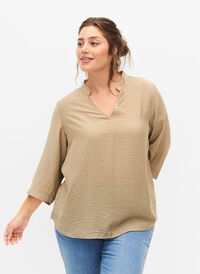 Solid color blouse with 3/4 sleeves, Coriander, Model