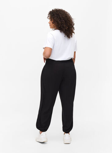 Loose-fitting trousers with smocking detail, Black, Model image number 0