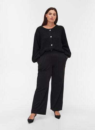 Loose trousers with pockets, Black, Model image number 0