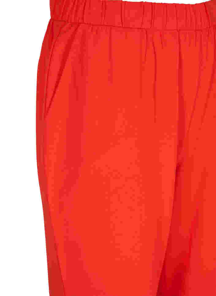 Flared trousers with pockets, Fiery Red, Packshot image number 2