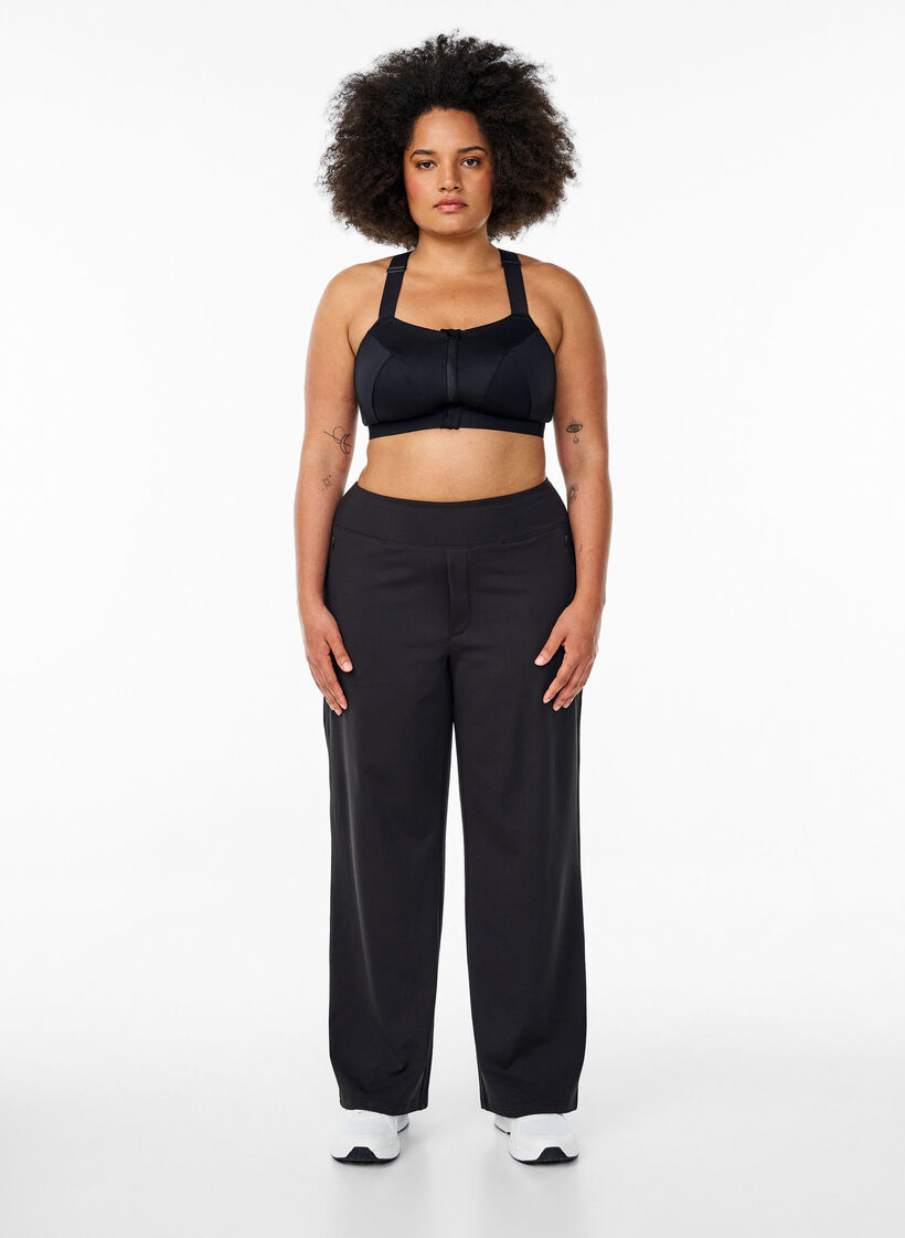 Stylish workout trousers with a slight flare, Black, Model
