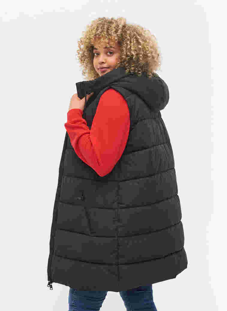 Long vest with hood and pockets, Black, Model image number 1
