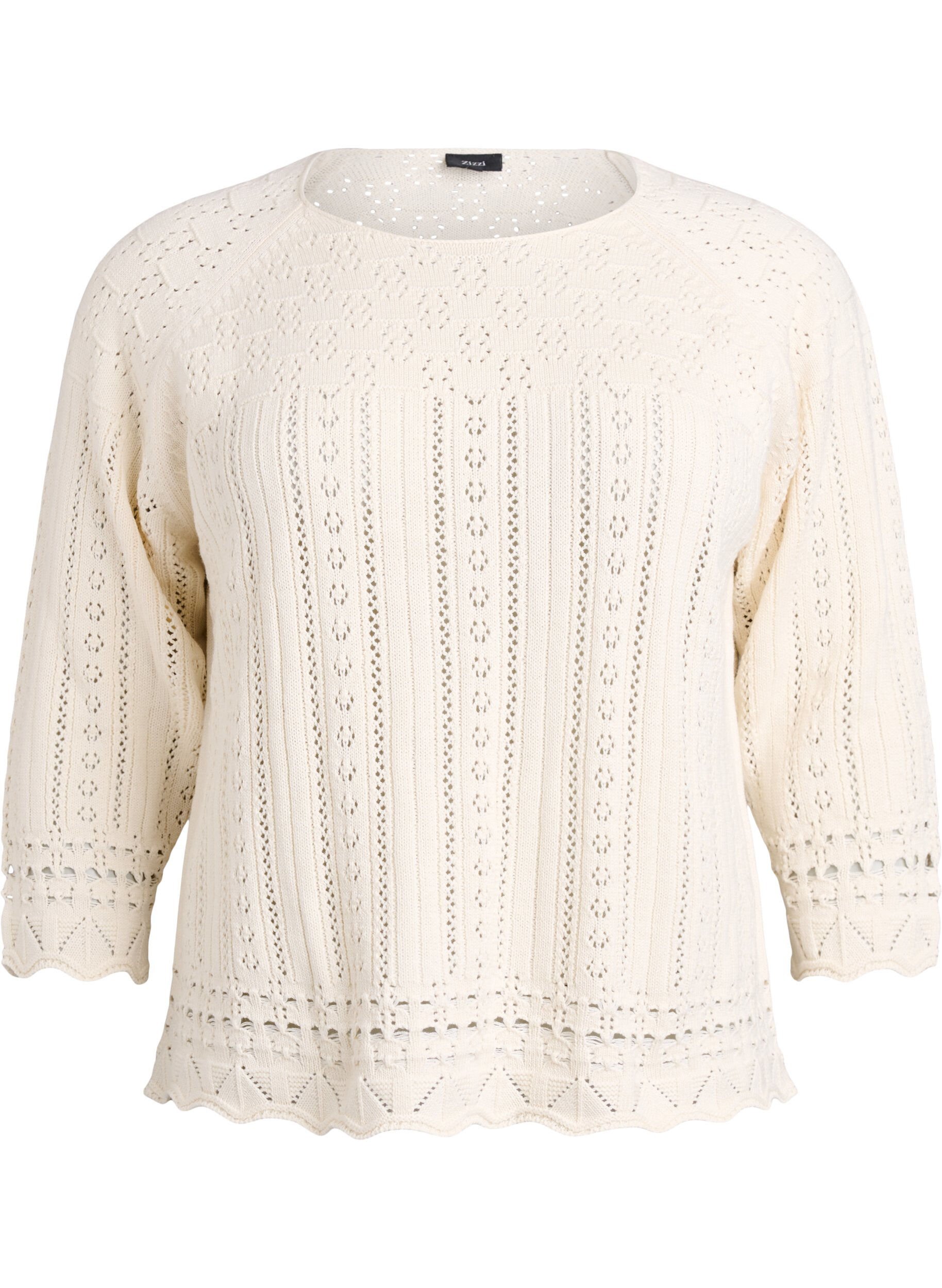 Knitted top with eyelet embroidery and 3/4 sleeves