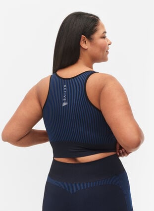 Seamless sports bra with stripes, Black w. Blue Depths, Model image number 1