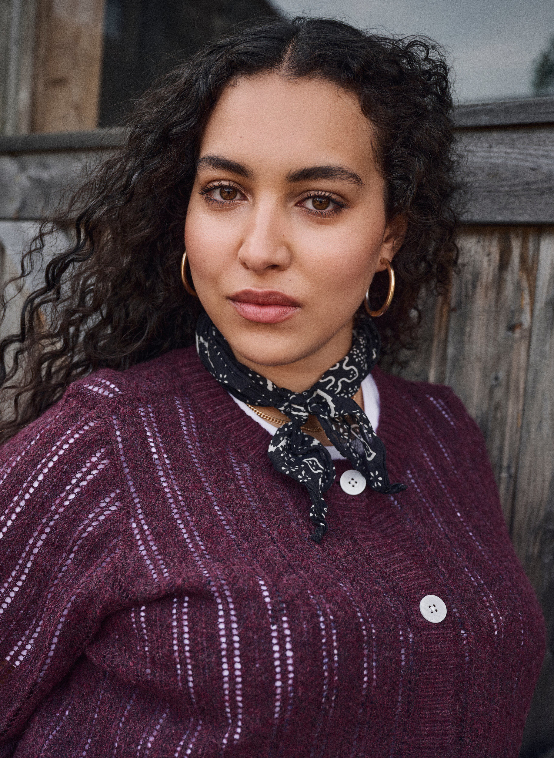 Knitted cardigan with openwork pattern