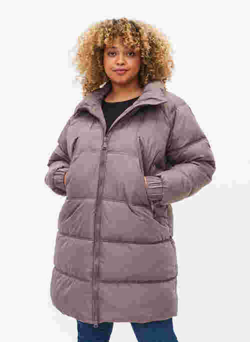 	 Winter jacket with pockets and high collar