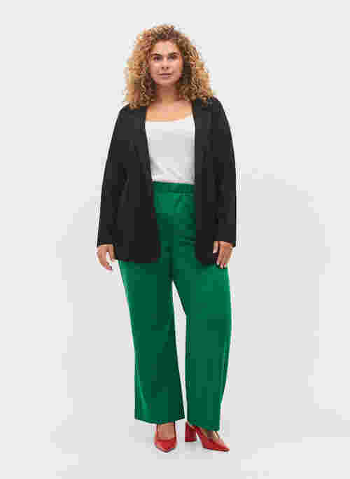 Flared trousers with pockets, Verdant Green, Model