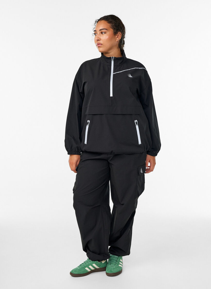 Trackpants with cargo pockets, Black, Model image number 0