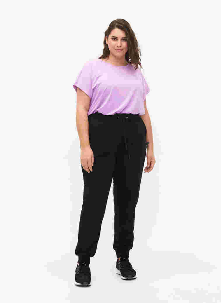 Loose workout trousers with pockets, Black, Model