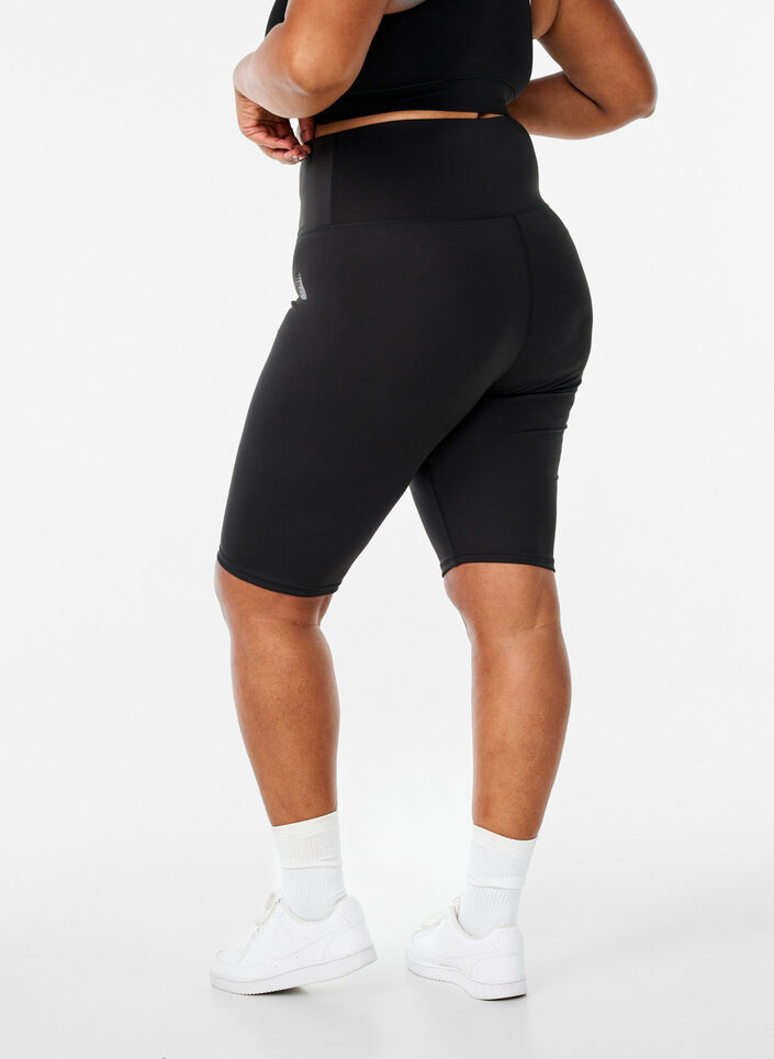 Long tight training shorts, Black, Packshot
