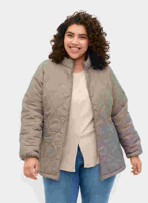 Quilted jacket with zip and pockets