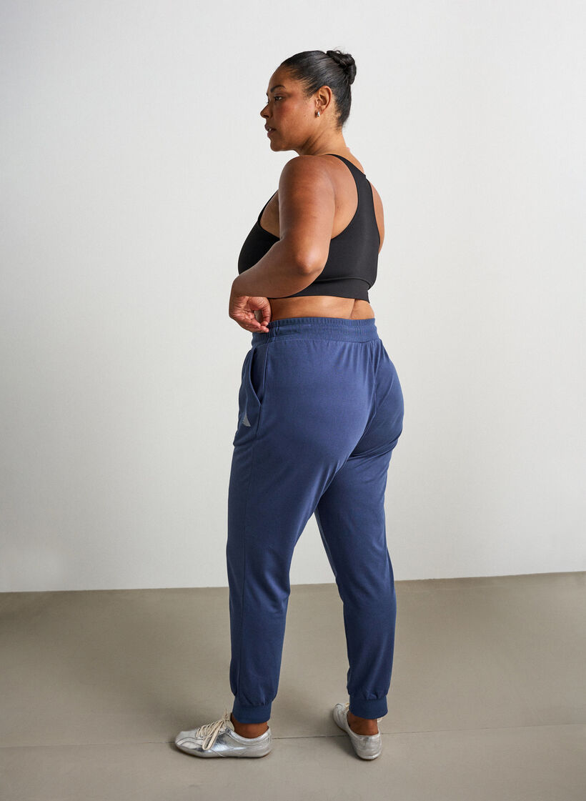 Loose tracksuit trousers with pockets, Blue, Model image number 1