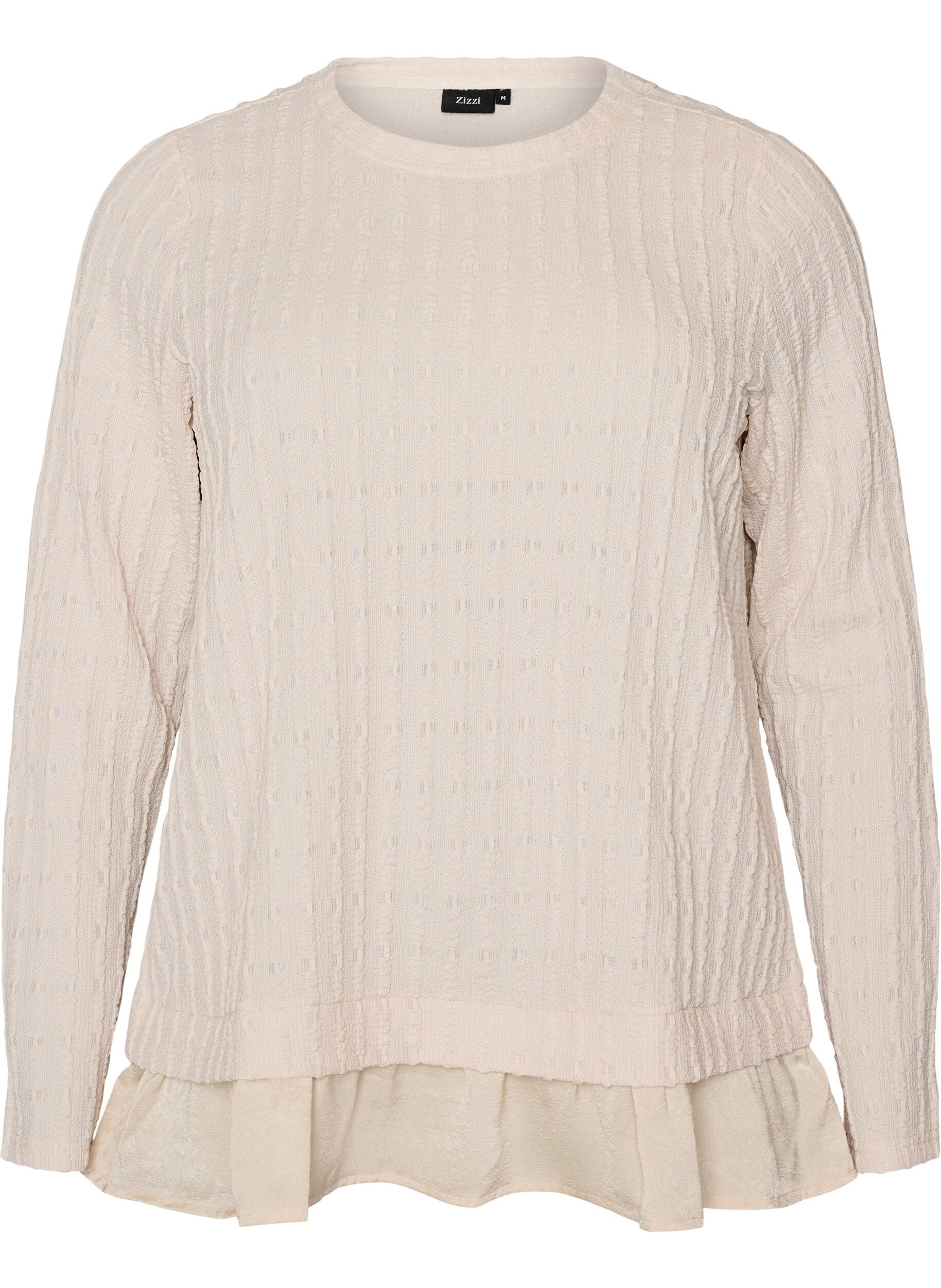 Structured blouse with ruffle hem