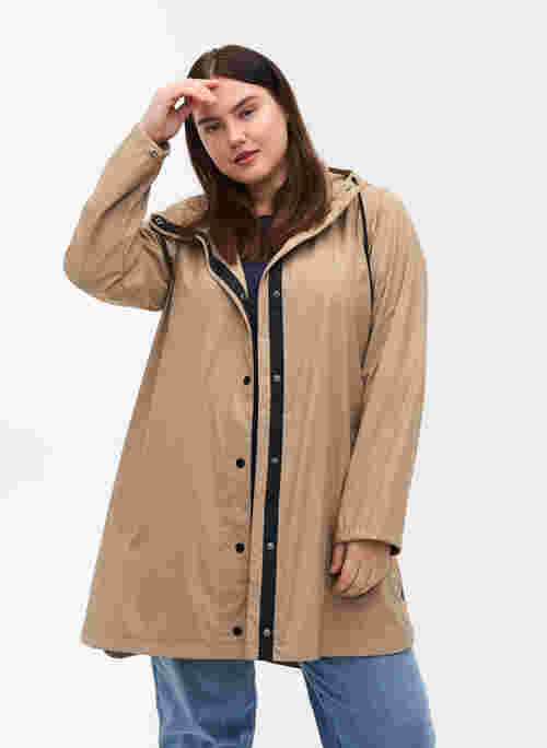 Rain coat with a hood and pockets