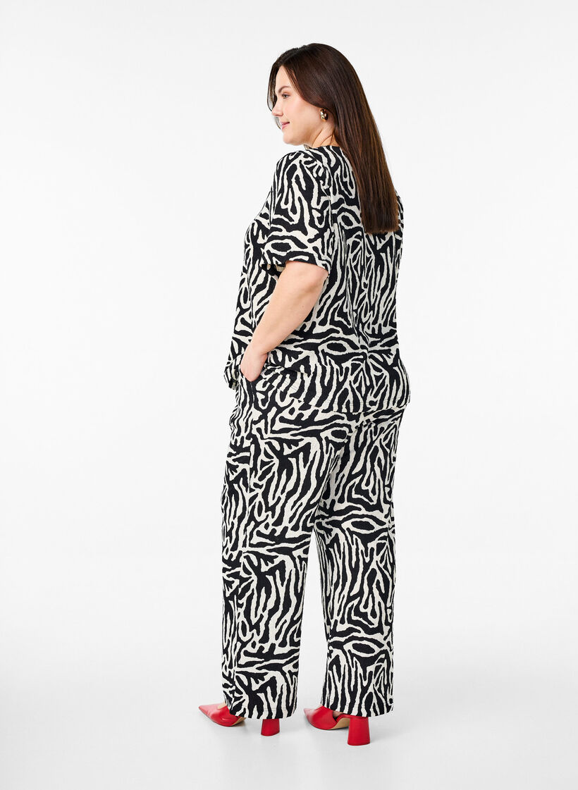 Trousers with zebra print, Black, Model image number 1