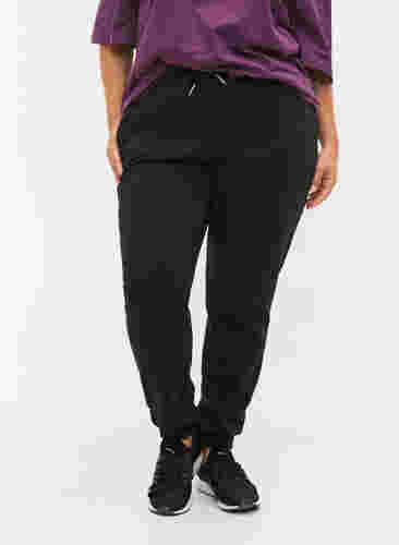 Sweatpants with tie string and pockets, Black, Model image number 2