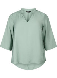Solid color blouse with 3/4 sleeves